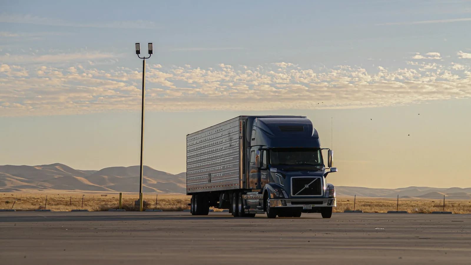 Straight truck parked at a freight stop